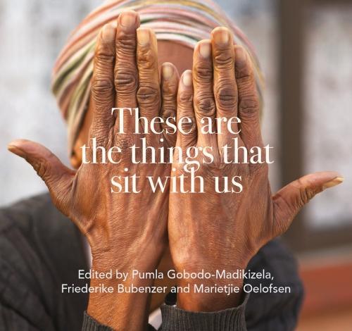 These are the things that sit with us (Paperback)