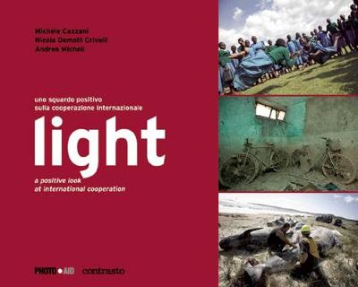 Light: A Positive Look at International Cooperation  *   Photoaid (Hardback)
