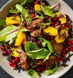 Recipe: Wok-fried five-spiced duck breast with orange and pomegranate wild rice salad