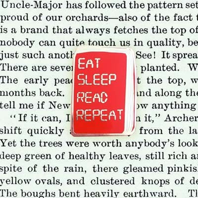 Eat Sleep Read Repeat Pin Badge